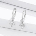 Boucles Floraison fleur en acier inoxydable portées à l'oreille - Luminori