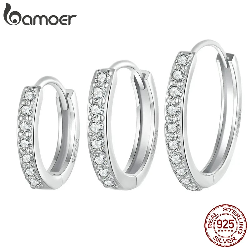 Créoles « Anneau de Lumière » — argent 925 et zirconium