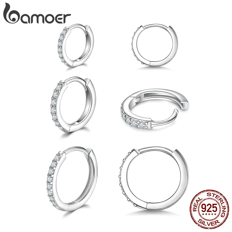 Créoles « Anneau de Lumière » — argent 925 et zirconium