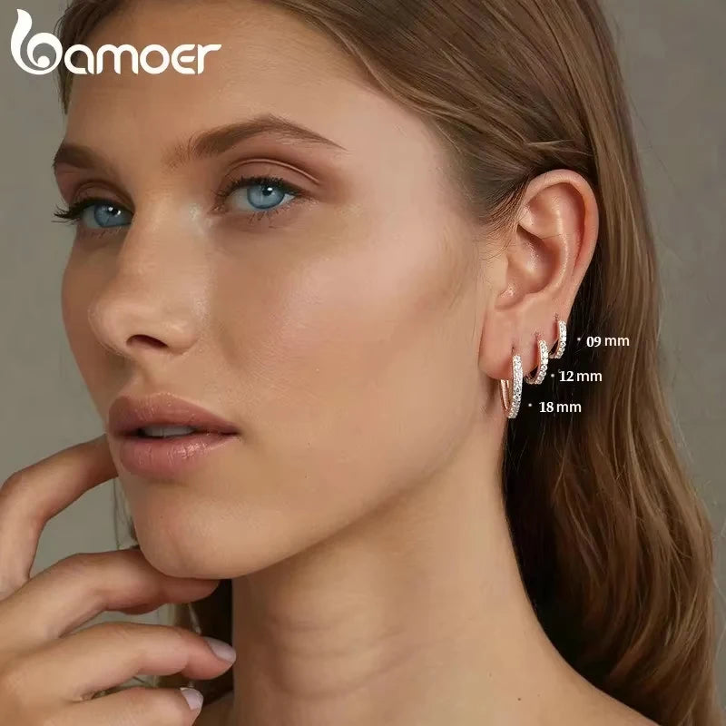Créoles « Anneau de Lumière » — argent 925 et zirconium