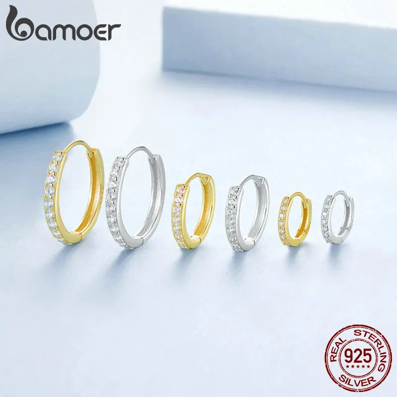 Créoles « Anneau de Lumière » — argent 925 et zirconium