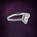 Bague Pétale de Givre argent 925, zirconium cubique incolore taille marquise dans un halo de petites pierres, anneau fin pavé sur le dessus