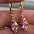 Boucles d'oreilles pendantes goutte en cristal rose, monture dorée – Luminori La Goutte de Sérénité