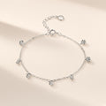 Bracelet Bulles de Savon argent 925, petits zirconiums cubiques incolores suspendus à une chaîne fine, sur fond crème