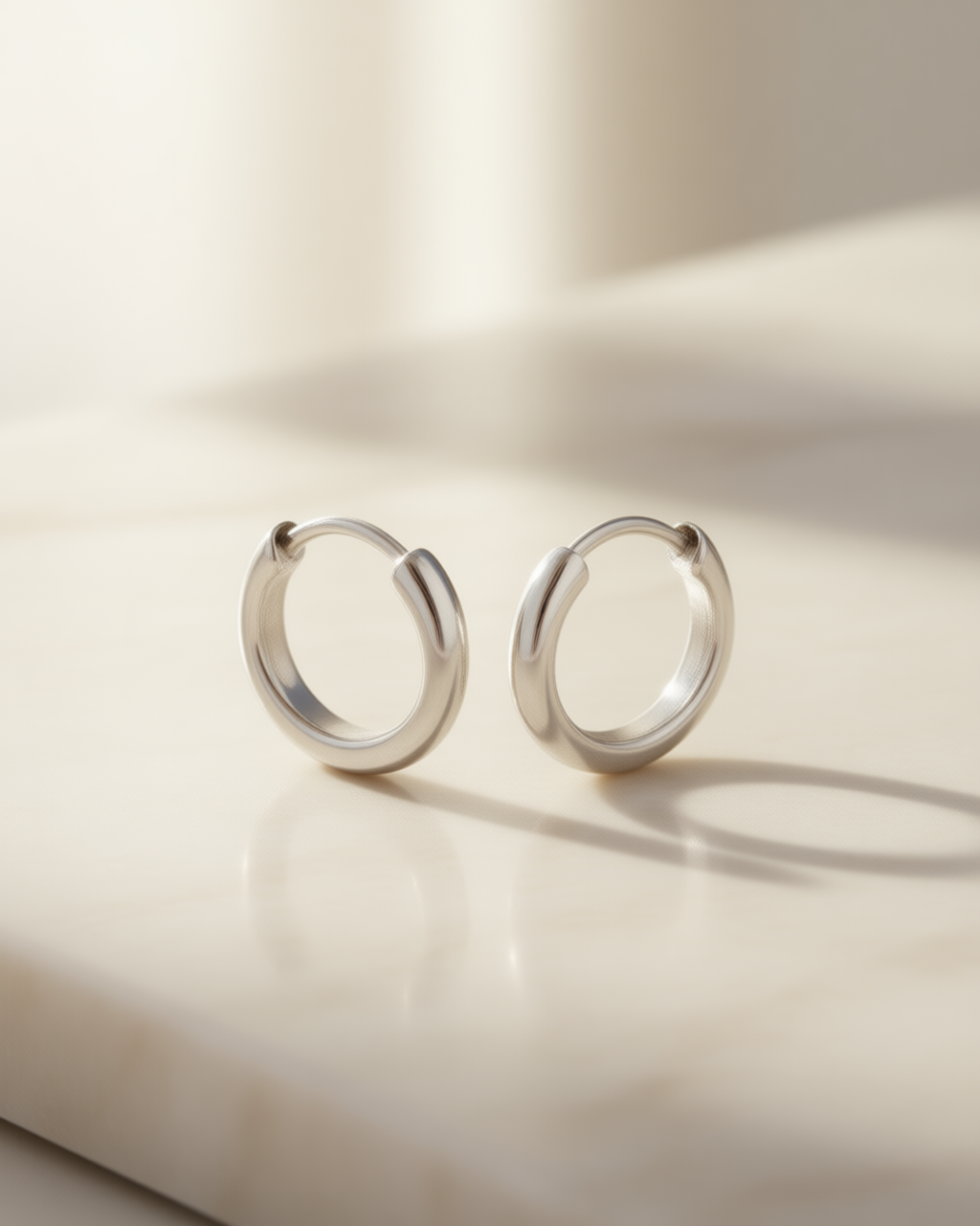 Créoles « Cercle du Jour » — argent 925, vue trois quarts