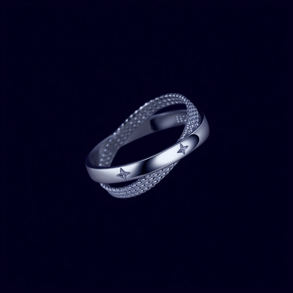 Bague Constellation argent 925, motif croisé et étoiles gravées, sur fond aubergine