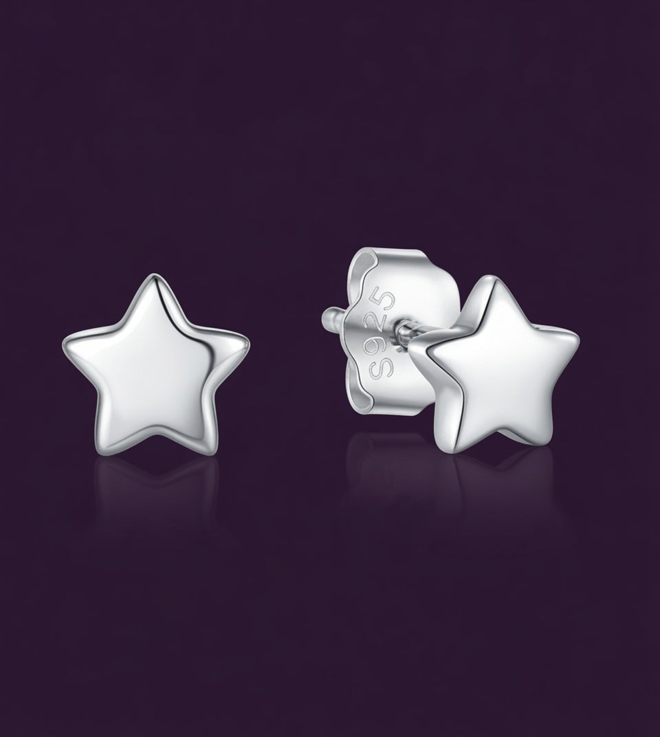 Puces Premier Ciel étoile, argent 925 poli, la paire sur fond aubergine