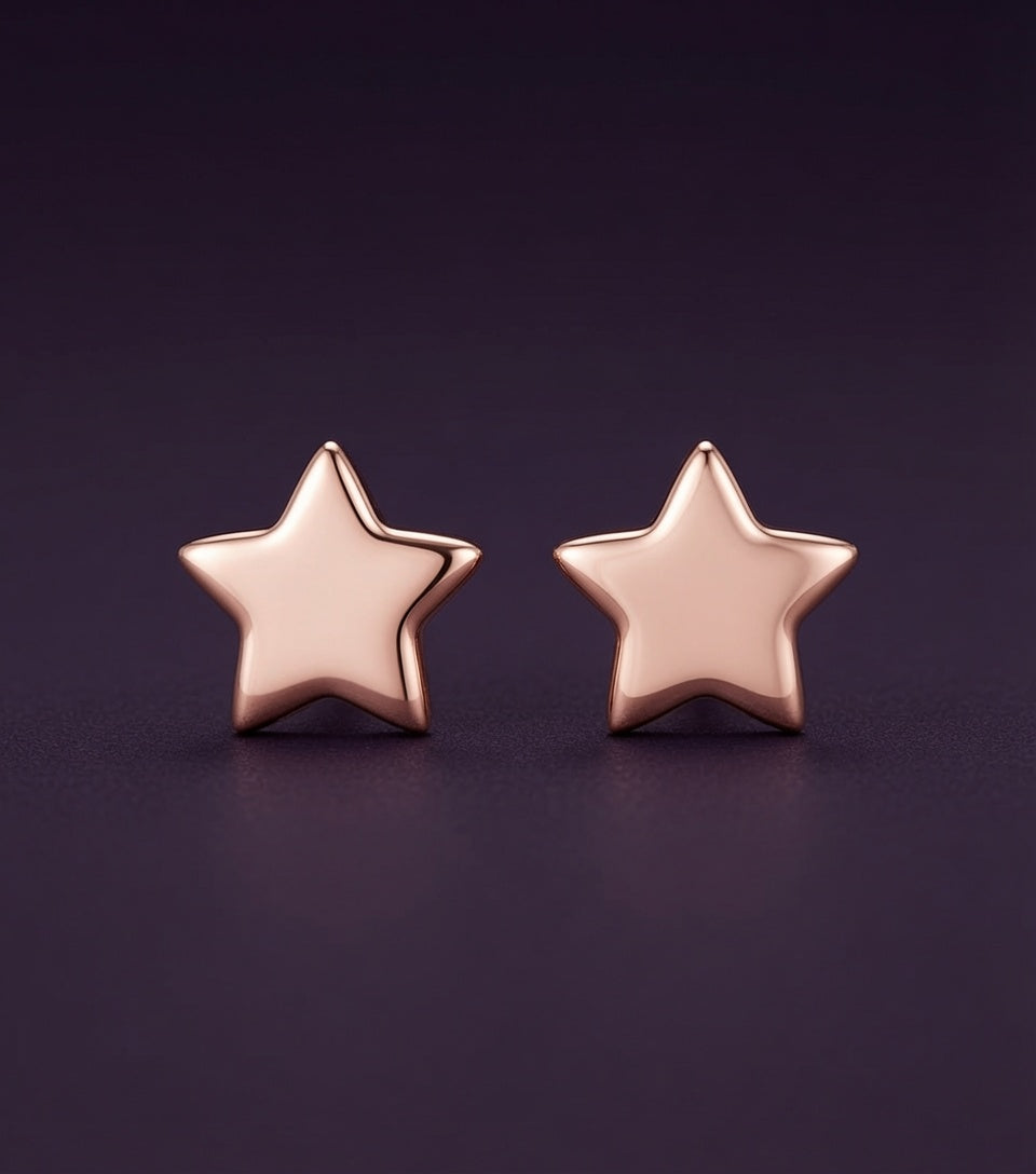 Puces Premier Ciel étoile, plaqué or rose sur argent 925, la paire sur fond aubergine
